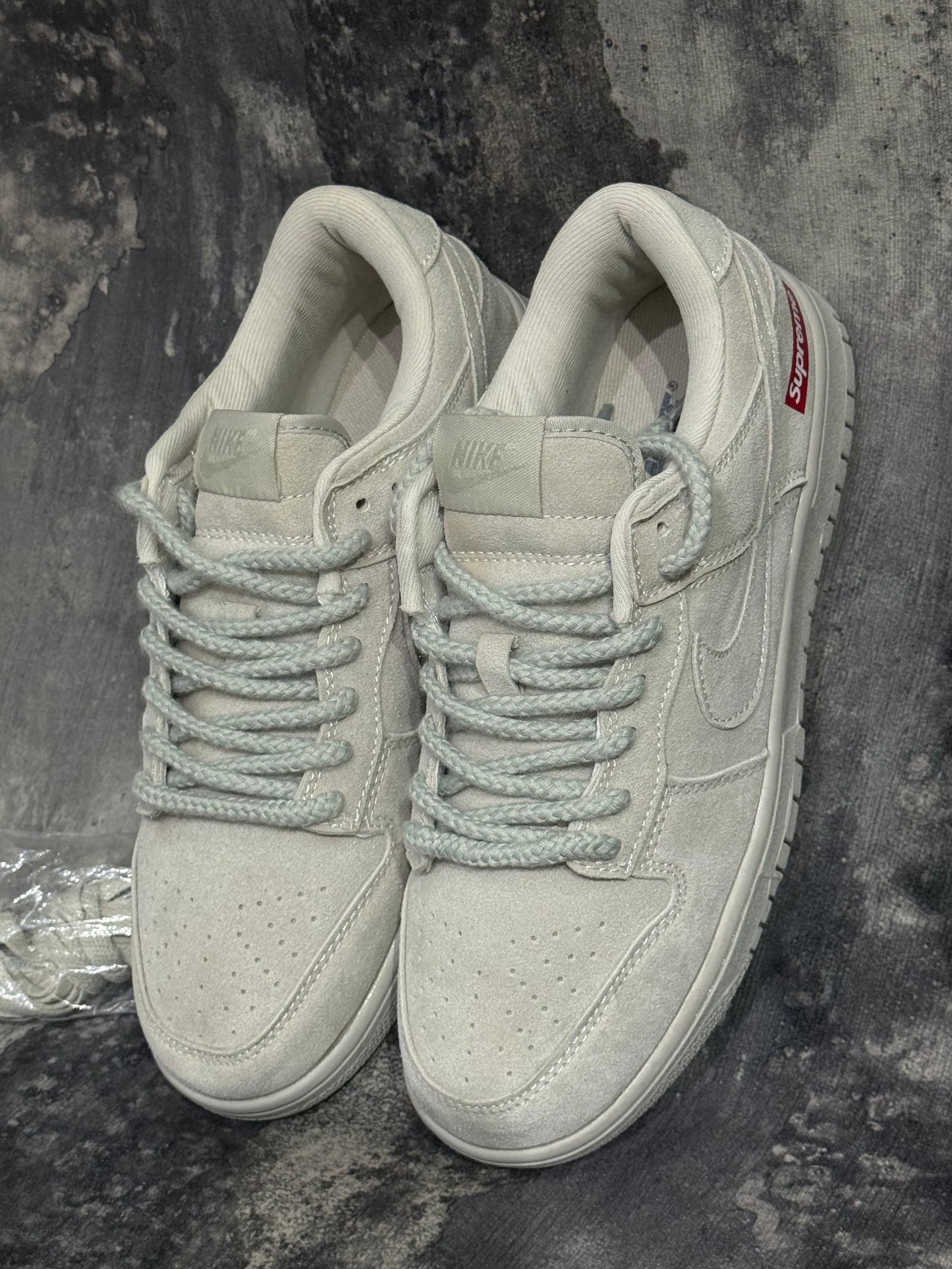 Nike SB Dunk Low x Supreme "White Cement"
