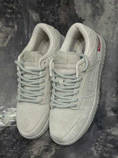 Nike SB Dunk Low x Supreme "White Cement"